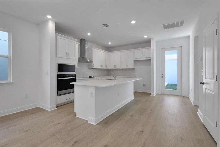 Furnished interior view inside a new home in Crossroads at Kelly Park, Apopka (Image 5). Furnished interior view inside a new home in Crossroads at Kelly Park, Apopka (Image 5).