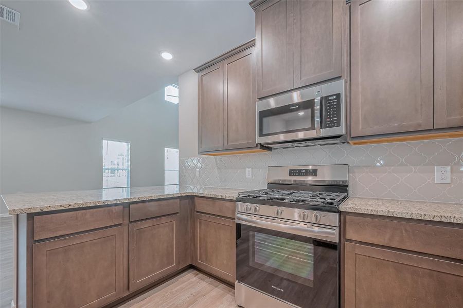 Furnished interior view inside a new home in Sunterra, Katy (Image 11). Furnished interior view inside a new home in Sunterra, Katy (Image 11).