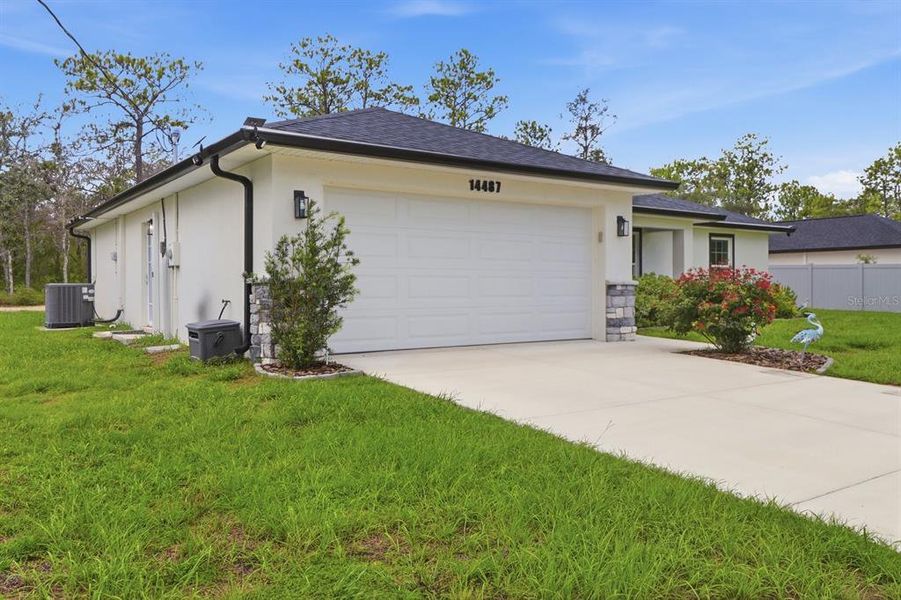 Front exterior of a new home in , Brooksville, FL, highlighting curb appeal (Image 27). Front exterior of a new home in , Brooksville, FL, highlighting curb appeal (Image 27).