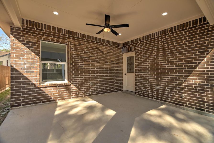 Exterior details and patio area of a home in , Houston (Image 3).