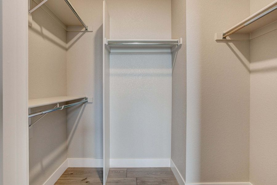 Primary Closet - Not Actual Home - Finishes May Vary