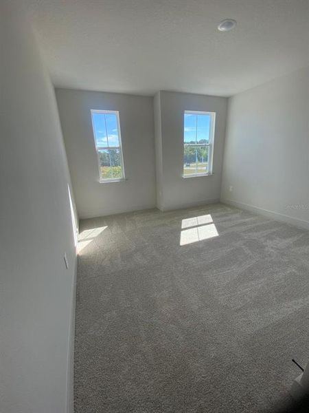 Spacious, unfurnished interior of a new home in Summerlake Reserve, Winter Garden (Image 14).