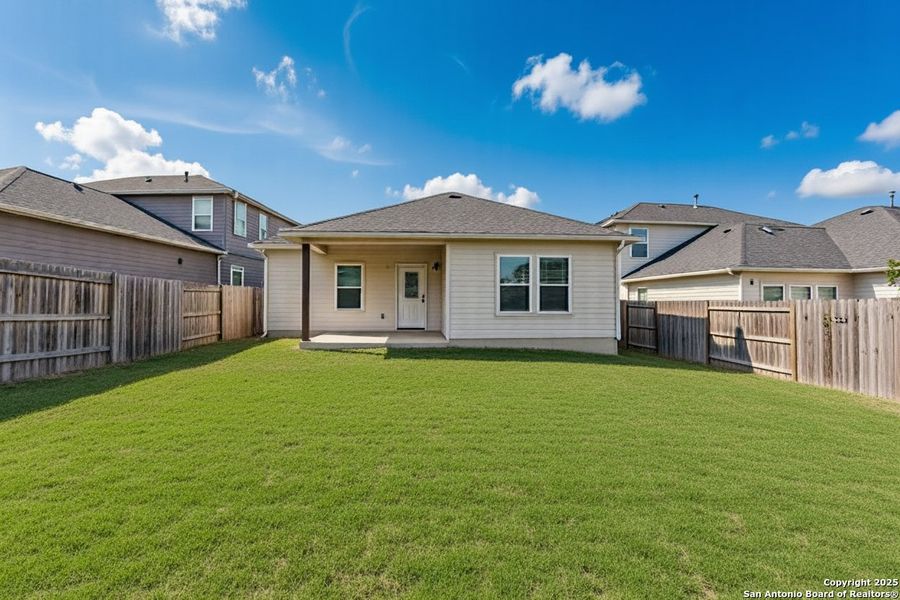 Front exterior of a new home in Hickory Ridge, Elmendorf, TX, highlighting curb appeal (Image 14). Front exterior of a new home in Hickory Ridge, Elmendorf, TX, highlighting curb appeal (Image 14).