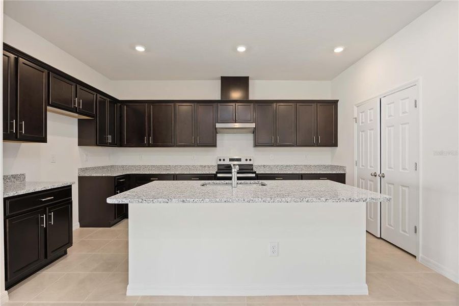 Furnished interior in a model home at Creekside at Rutland Ranch in Parrish (Image 8).