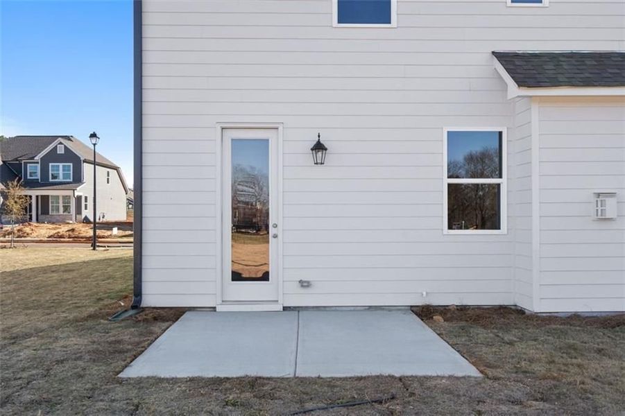 Front exterior of a new home in Wehunt Meadows, Hoschton, GA, highlighting curb appeal (Image 12).