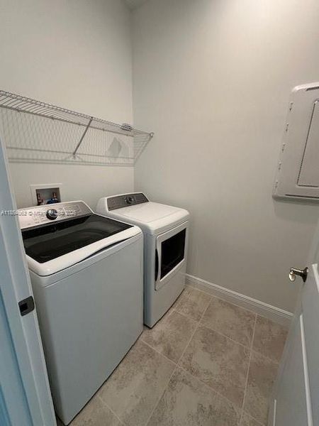 Furnished interior view inside a new home in , Port St. Lucie (Image 12).