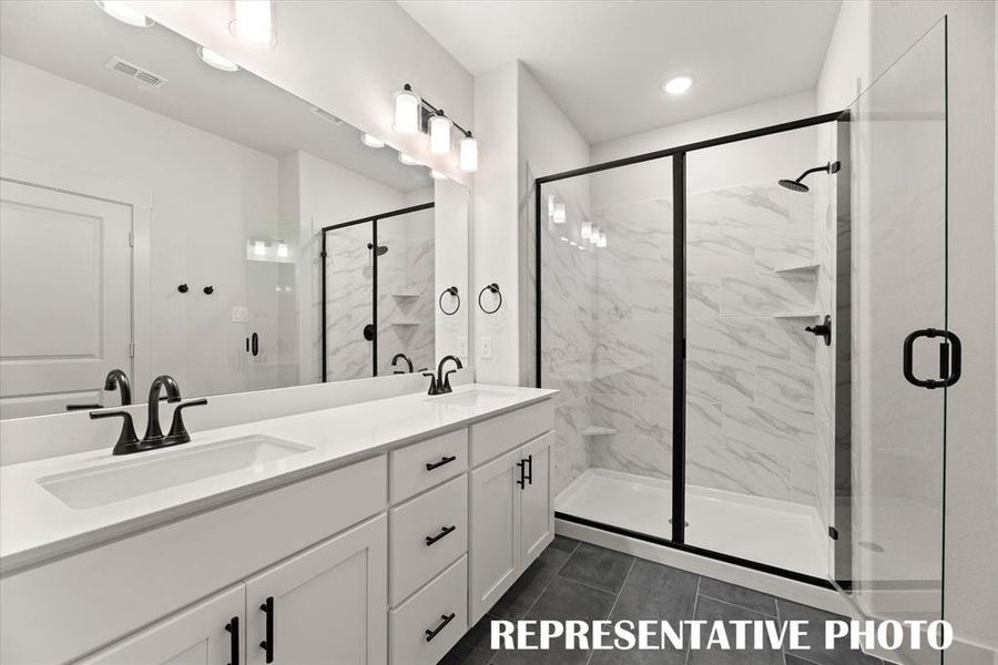 You'll find a lovely, spacious walk in shower in this dream owner's bath!  REPRESENTATIVE PHOTO