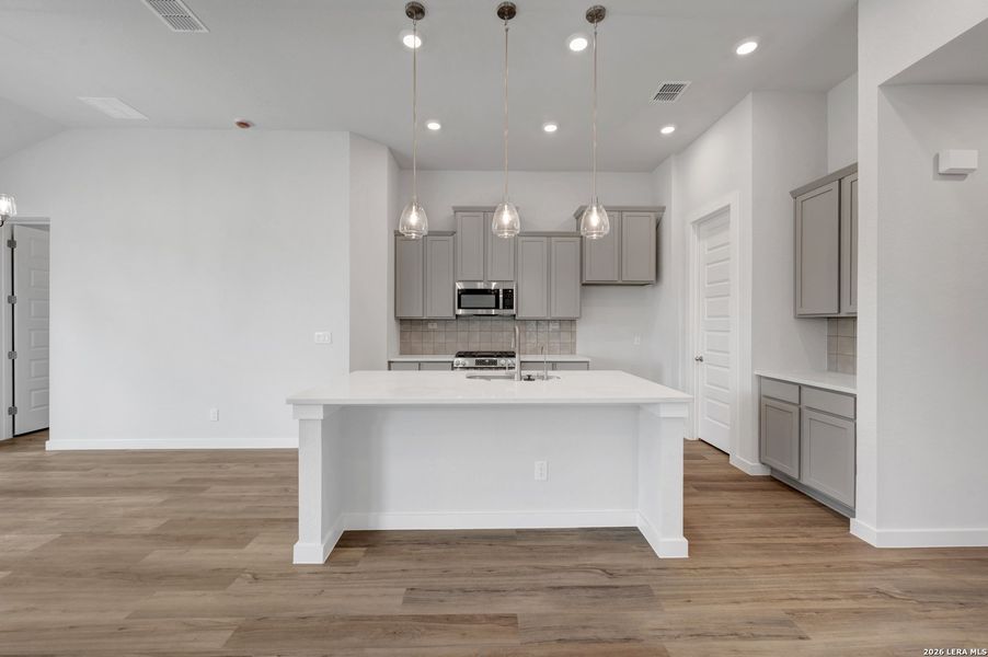 Furnished interior view inside a new home in August Fields, New Braunfels (Image 6).