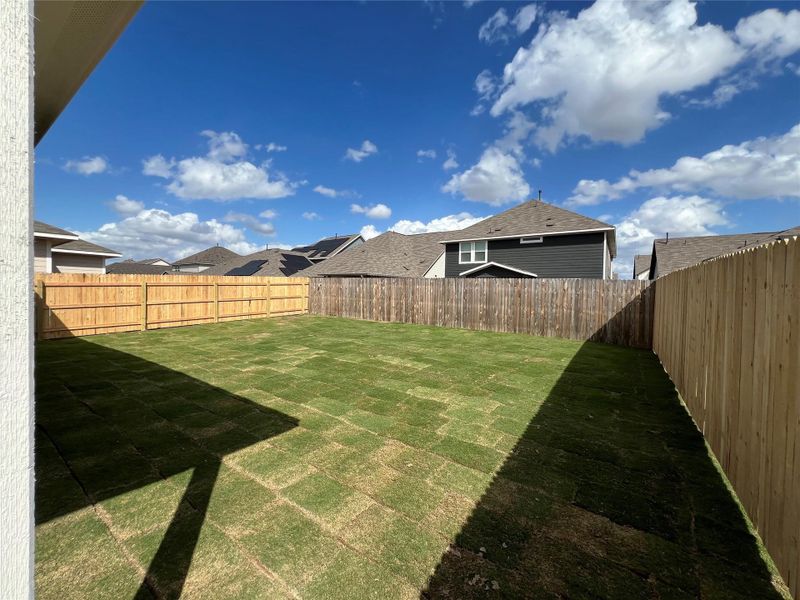 Exterior details and patio area of a home in Rolling Glen, Hutto (Image 19).