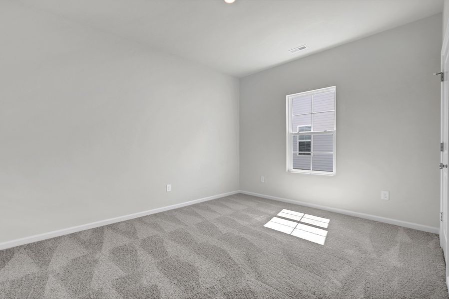 Spacious, unfurnished interior of a new home in River Tide Farms, Bolivia (Image 23).