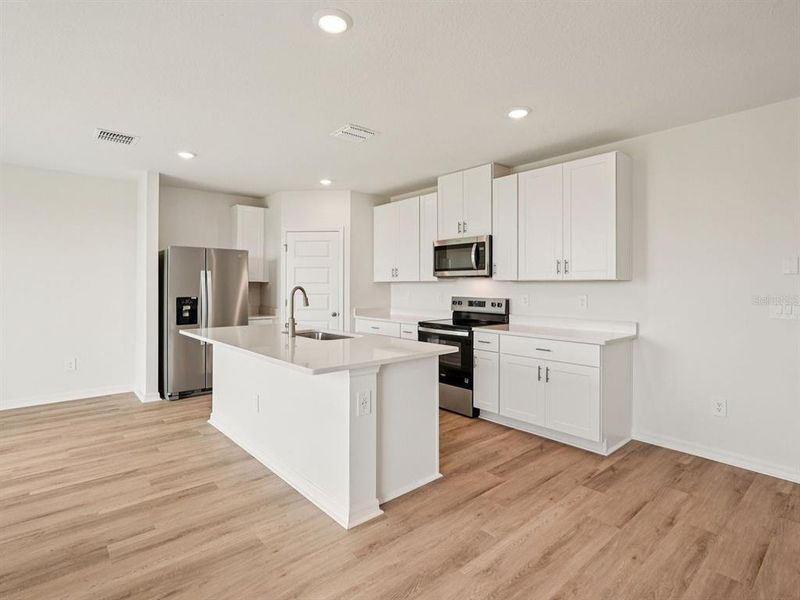 Furnished interior view inside a new home in Coasterra - Premier Series, Palmetto (Image 7).