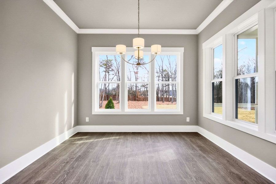Representative unfurnished interior of a home built from the Brassfield Craftsman by Homes by Dickerson in Corbett Landing, Pittsboro (Image 10).