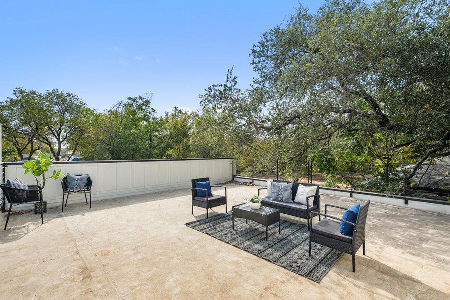 View of patio with an outdoor living space