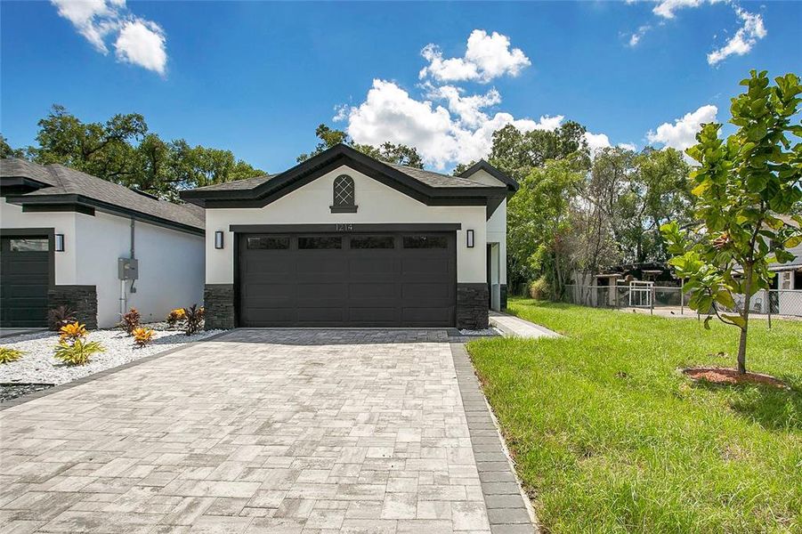 Front exterior of a new home in , Apopka, FL, highlighting curb appeal (Image 21).