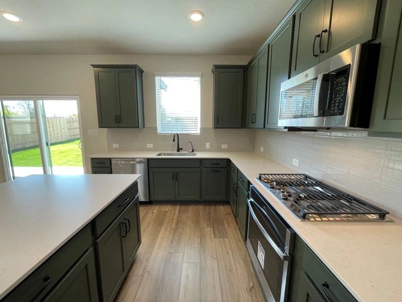 Furnished interior view inside a new home in Covered Bridge, Hutto (Image 7). Furnished interior view inside a new home in Covered Bridge, Hutto (Image 7).