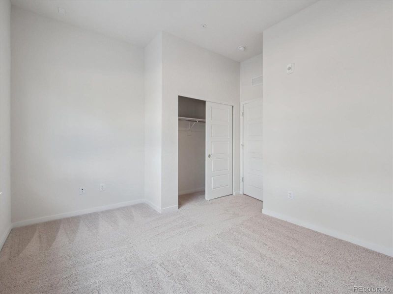 Spacious, unfurnished interior of a new home in Condo Collection at Grand Vue at Interlocken, Broomfield (Image 13).