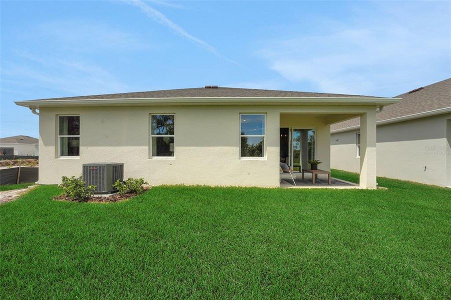 Exterior details and patio area of a home in Willowbrook North, Winter Haven (Image 3).