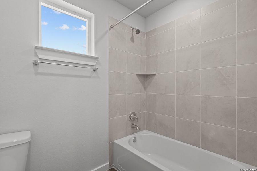 Furnished interior view inside a new home in Senna, Leon Valley (Image 9).