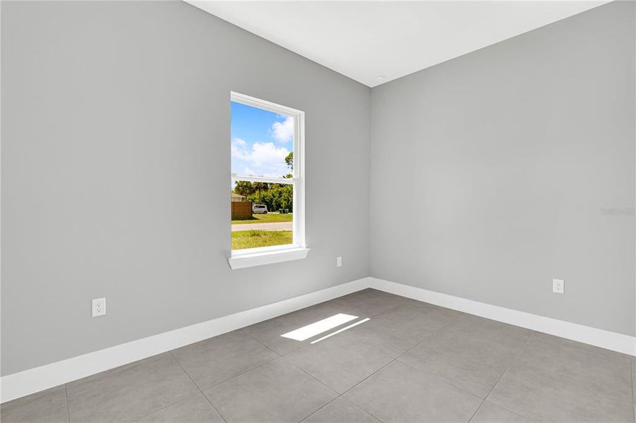 Spacious, unfurnished interior of a new home in , Port Charlotte (Image 11).