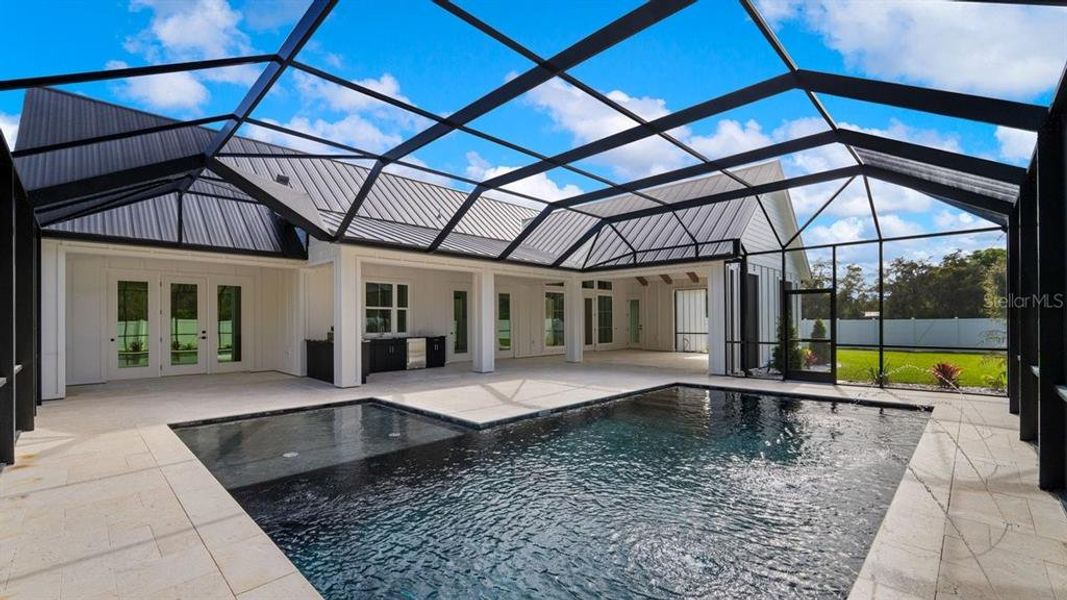 Exterior details and patio area of a home in , Port Orange (Image 46).