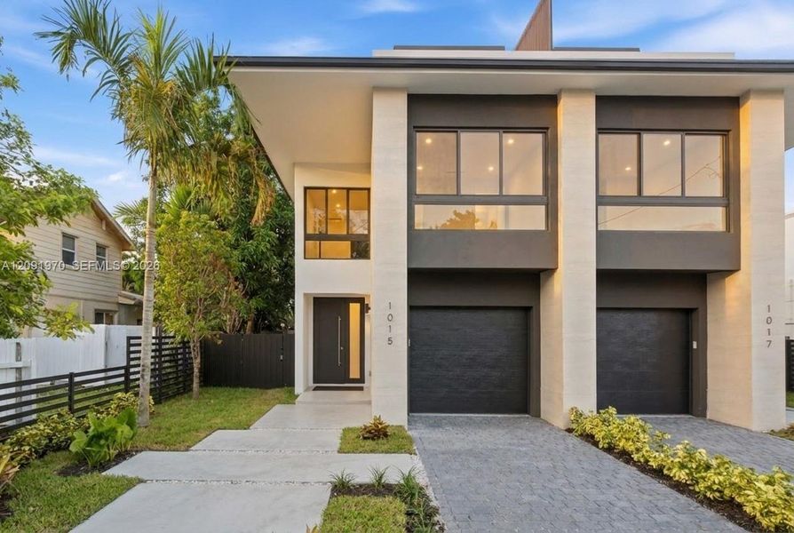 Front exterior of a new home in , Miami, FL, highlighting curb appeal (Image 24).