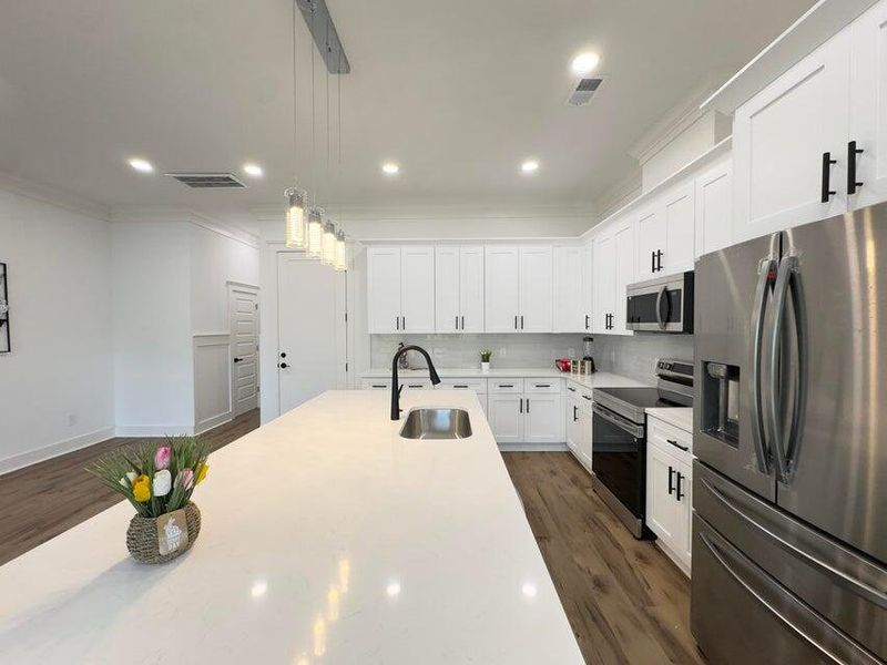 Furnished interior view inside a new home in , North Charleston (Image 7).