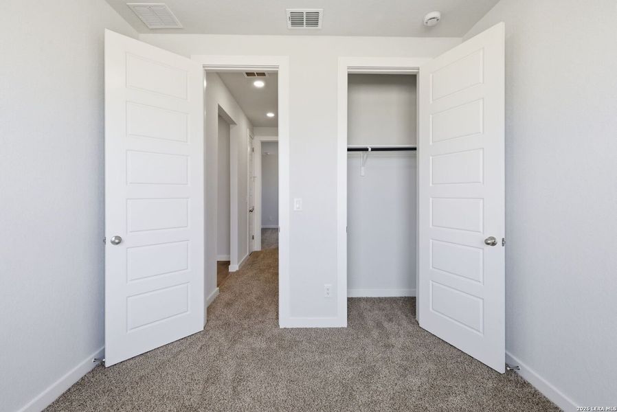 Spacious, unfurnished interior of a new home in The Meadows at Hunters Ranch, San Antonio (Image 30).
