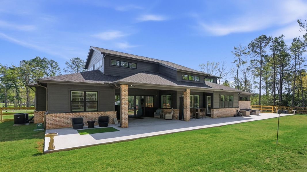 Exterior details and patio area of a home in , Magnolia (Image 3).