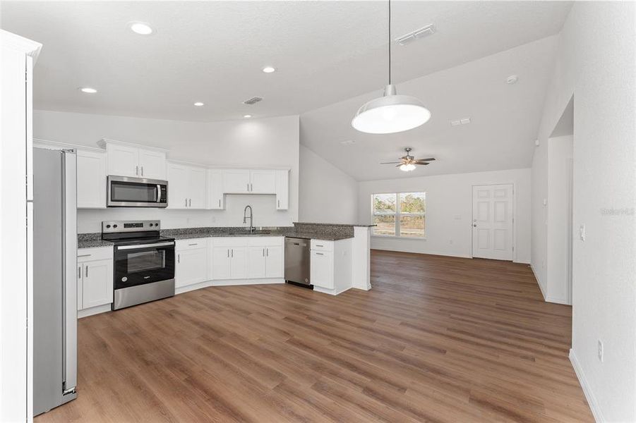 Nice view from dining area into kitchen.