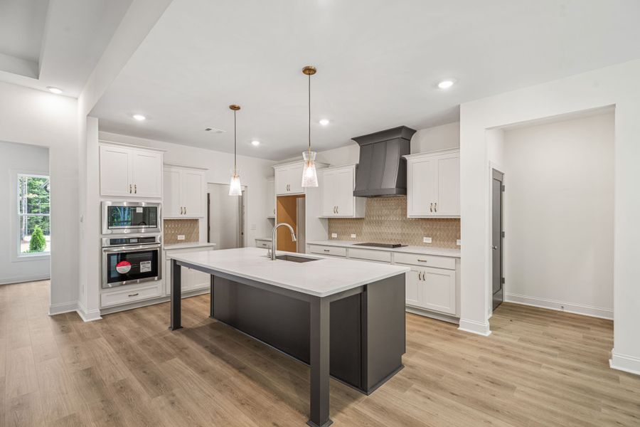 Furnished interior view inside a new home in Flint Farms, Concord (Image 14).