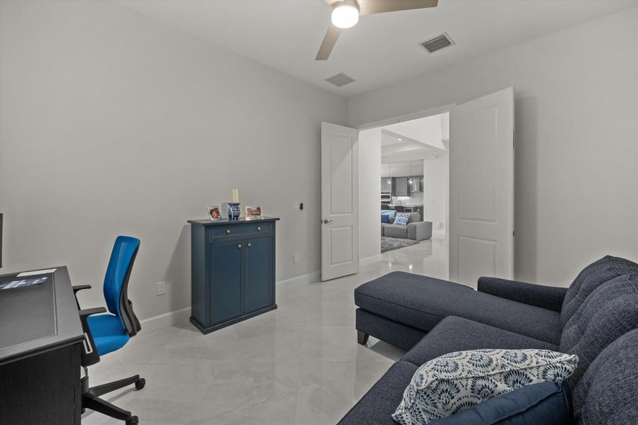 Furnished interior view inside a new home in , The Acreage (Image 18).