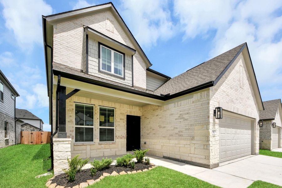 The residence features a practical 2-car garage complemented by a generous driveway, ensuring abundant space for parking needs. The residence features a practical 2-car garage complemented by a generous driveway, ensuring abundant space for parking needs.
