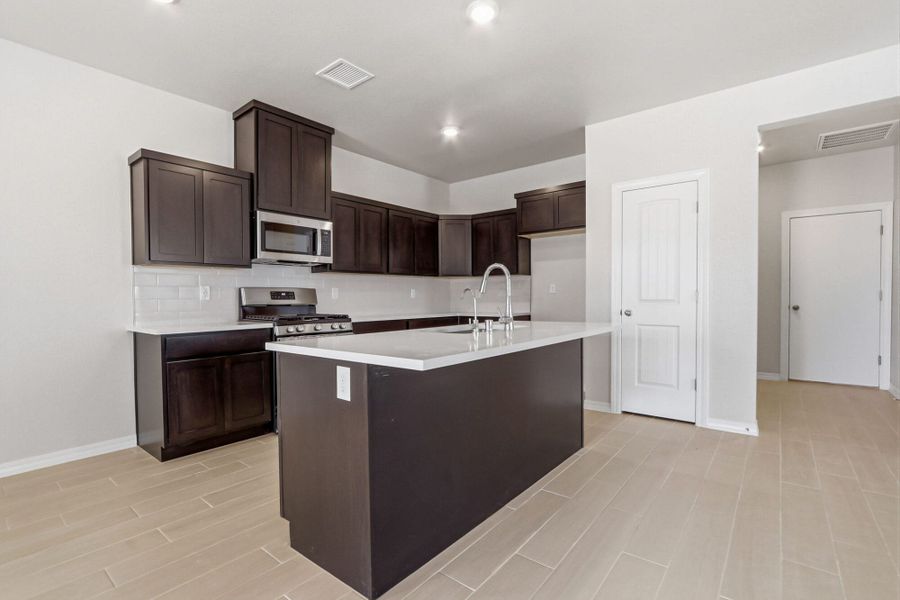 Representative furnished interior of a home built from the Poppy by View Homes in Paseos Del Este, El Paso (Image 17).