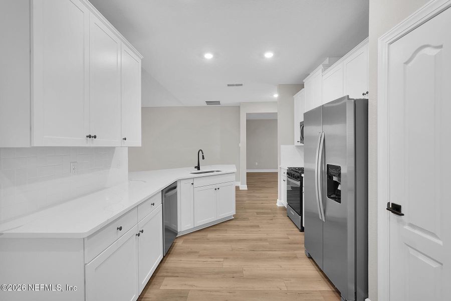 Furnished interior view inside a new home in , Jacksonville (Image 8).