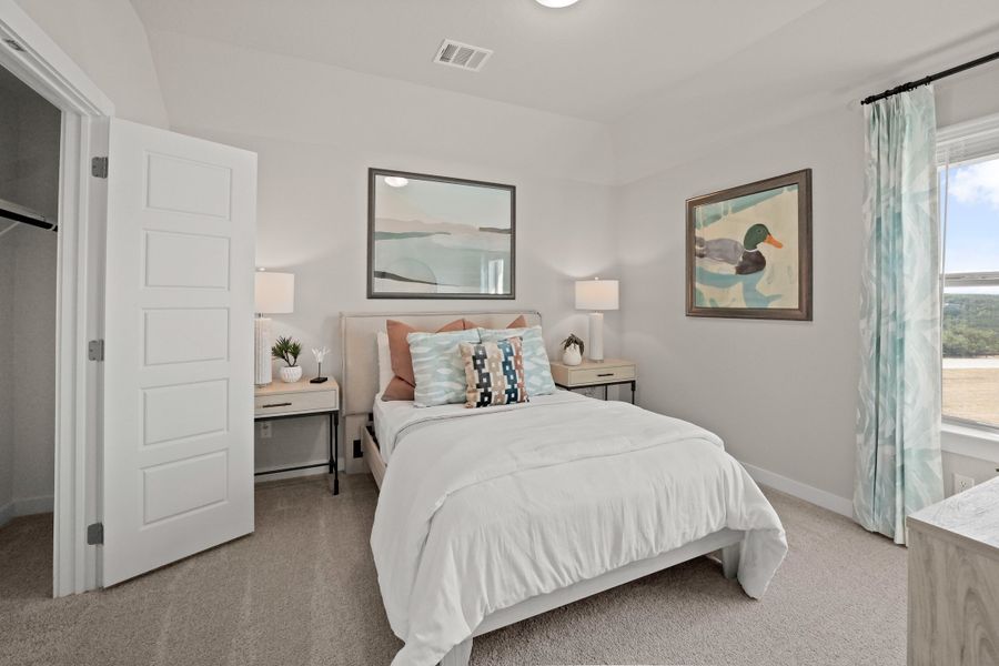 Bedroom in the Willow home plan by Trophy Signature Homes – REPRESENTATIVE PHOTO
