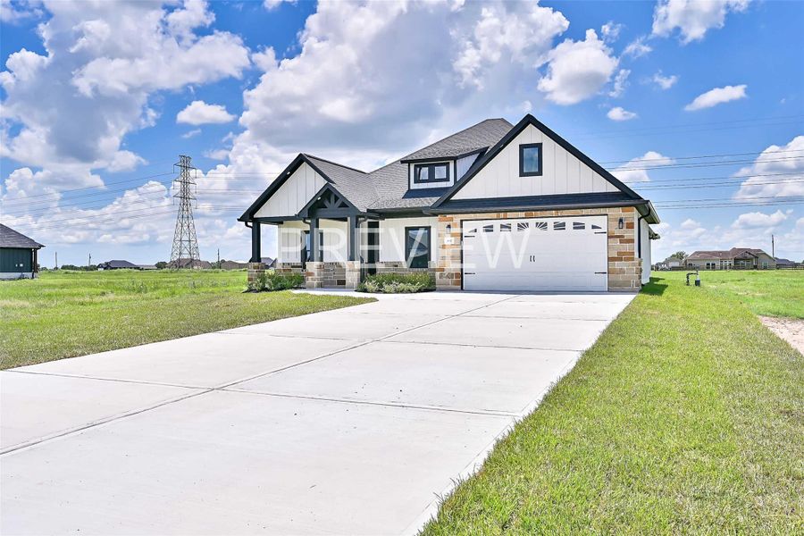 Front exterior of a new home in , Angleton, TX, highlighting curb appeal (Image 23).