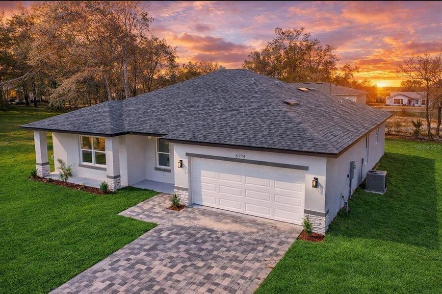 Front exterior of a new home in , Citrus Springs, FL, highlighting curb appeal (Image 2). Front exterior of a new home in , Citrus Springs, FL, highlighting curb appeal (Image 2).