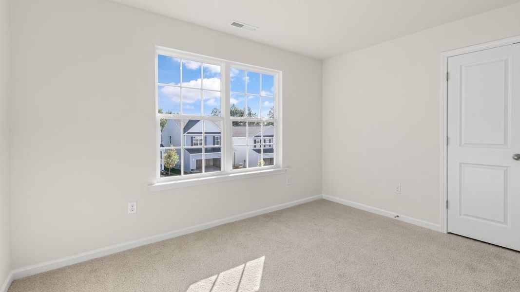 Spacious, unfurnished interior of a new home in The Grove at Matthews Landing, Fuquay Varina (Image 29).