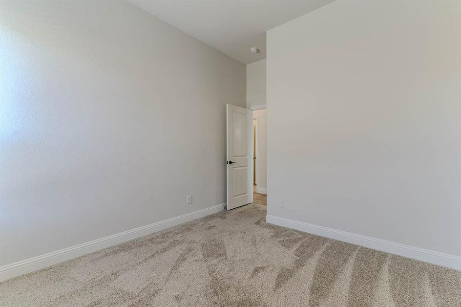 Spacious, unfurnished interior of a new home in Coyote Crossing, Godley (Image 22).