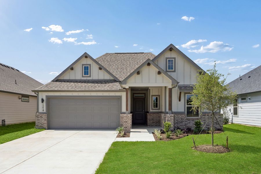 Front exterior of a new home in Riviera Pines, Huffman, TX, highlighting curb appeal (Image 1). Front exterior of a new home in Riviera Pines, Huffman, TX, highlighting curb appeal (Image 1).