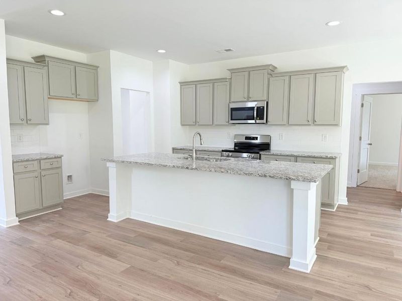 Furnished interior view inside a new home in Westlyn, Winder (Image 7).