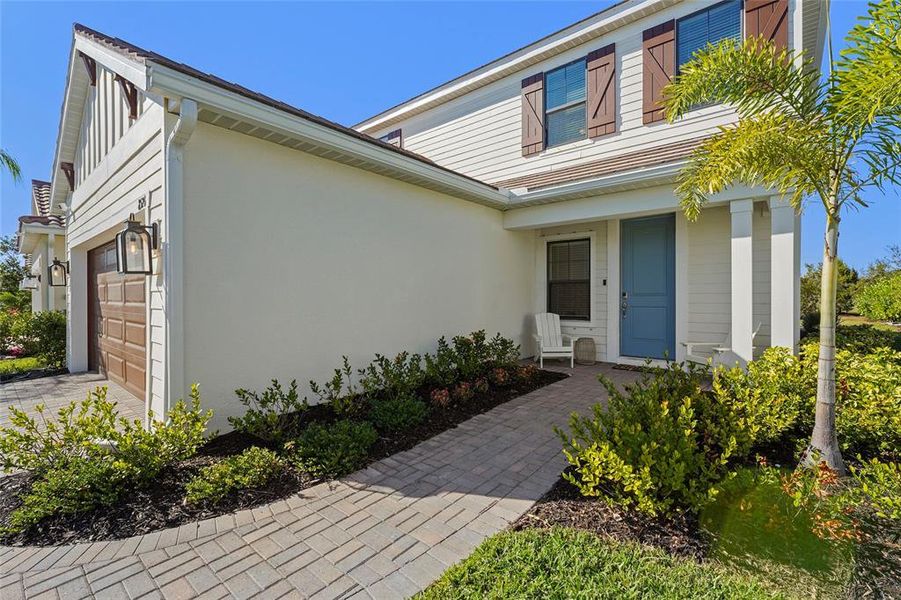 Exterior details and patio area of a home in , Sarasota (Image 37).