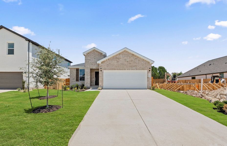 Front exterior of a new home in Woodside, Georgetown, TX, highlighting curb appeal (Image 19).