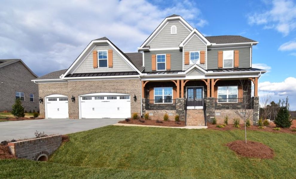 Representative exterior photo of a completed home built from the Lancaster by Keystone Homes NC in Preserve at Carriage Cove, Oak Ridge, NC (Image 28).