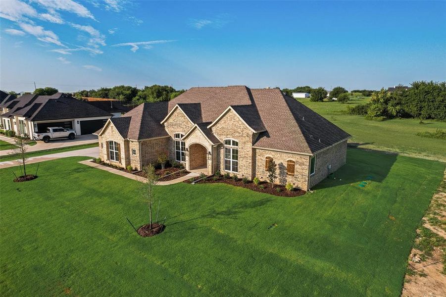 Front exterior of a new home in , Midlothian, TX, highlighting curb appeal (Image 18).