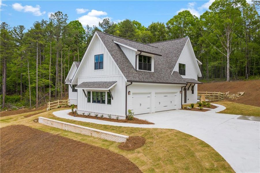 Front exterior of a new home in , Rydal, GA, highlighting curb appeal (Image 26). Front exterior of a new home in , Rydal, GA, highlighting curb appeal (Image 26).