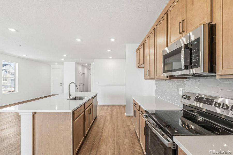 Furnished interior view inside a new home in Legato, Commerce City (Image 5).