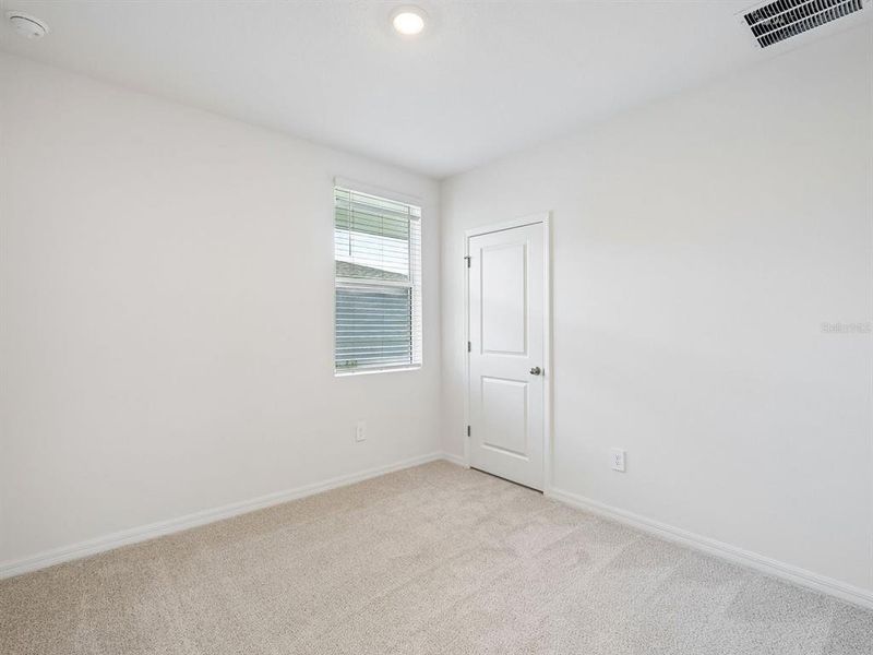 Spacious, unfurnished interior of a new home in Coasterra - Premier Series, Palmetto (Image 18). Spacious, unfurnished interior of a new home in Coasterra - Premier Series, Palmetto (Image 18).