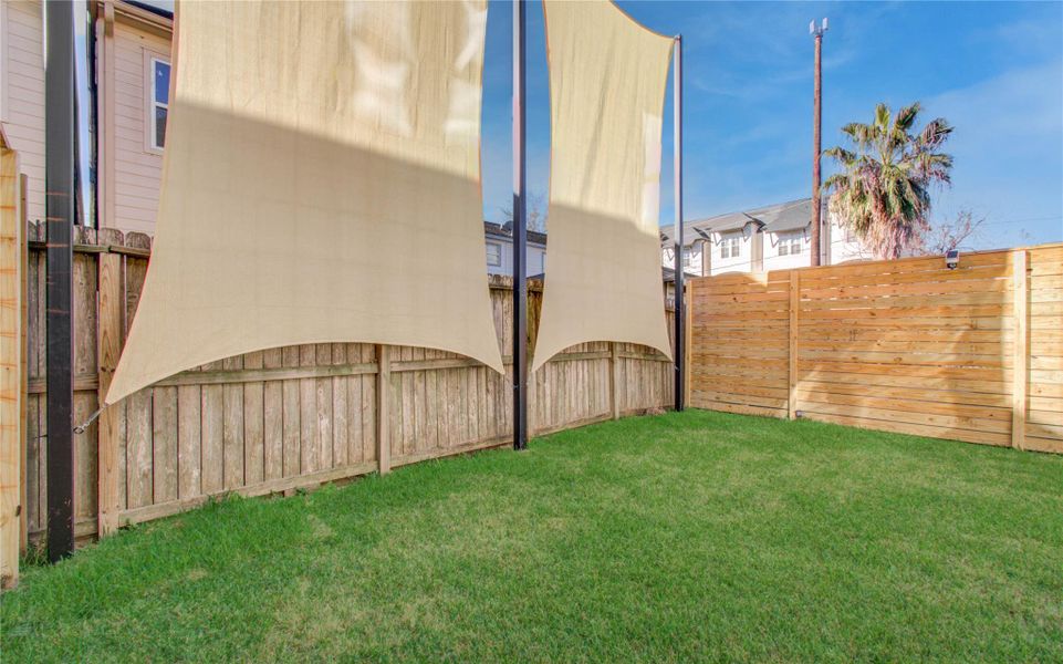Exterior details and patio area of a home in , Houston (Image 29).
