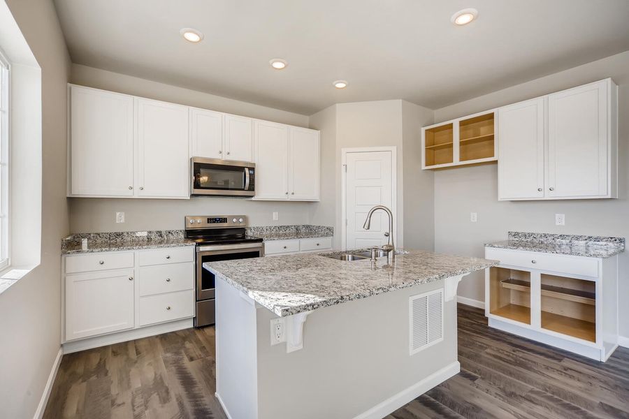 Whole kitchen of the Fraser floor plan by Century Communities